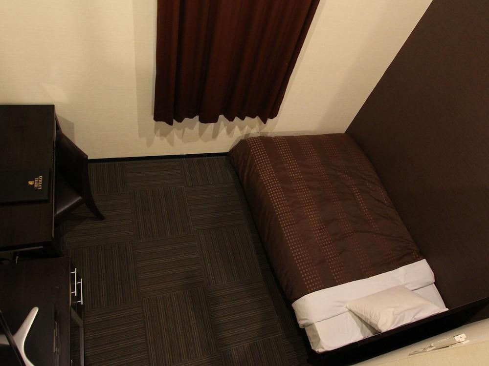 HOTEL LiVEMAX BUDGET Esaka Suita Exterior foto